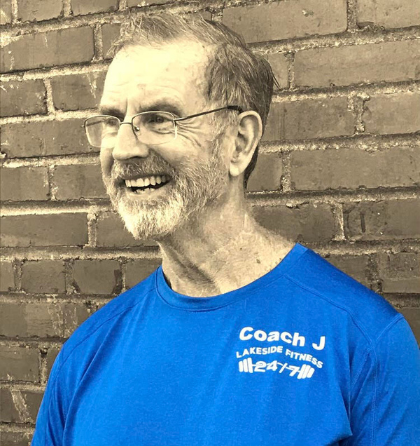 Picture of John Odland with brick background